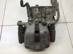 Суппорт тормозной задний правый со скобой 