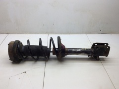 Амортизатор задний левый в сборе с пружиной GG 