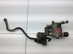Фланец Тройник системы охлаждения двигателя 