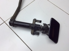 Форсунка омывателя левой фары с крышкой черная 