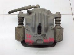 Суппорт тормозной задний левый со скобой 