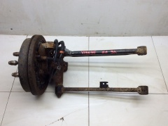 Кулак задний левый с тормозным барабаном и тросом 