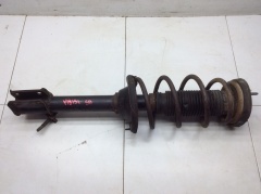 Амортизатор задний левый в сборе с пружиной 