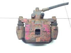 Суппорт тормозной задний правый со скобой 