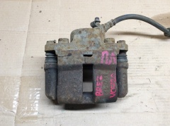 Суппорт тормозной передний левый со скобой 