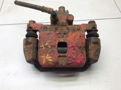 Суппорт тормозной задний левый со скобой 